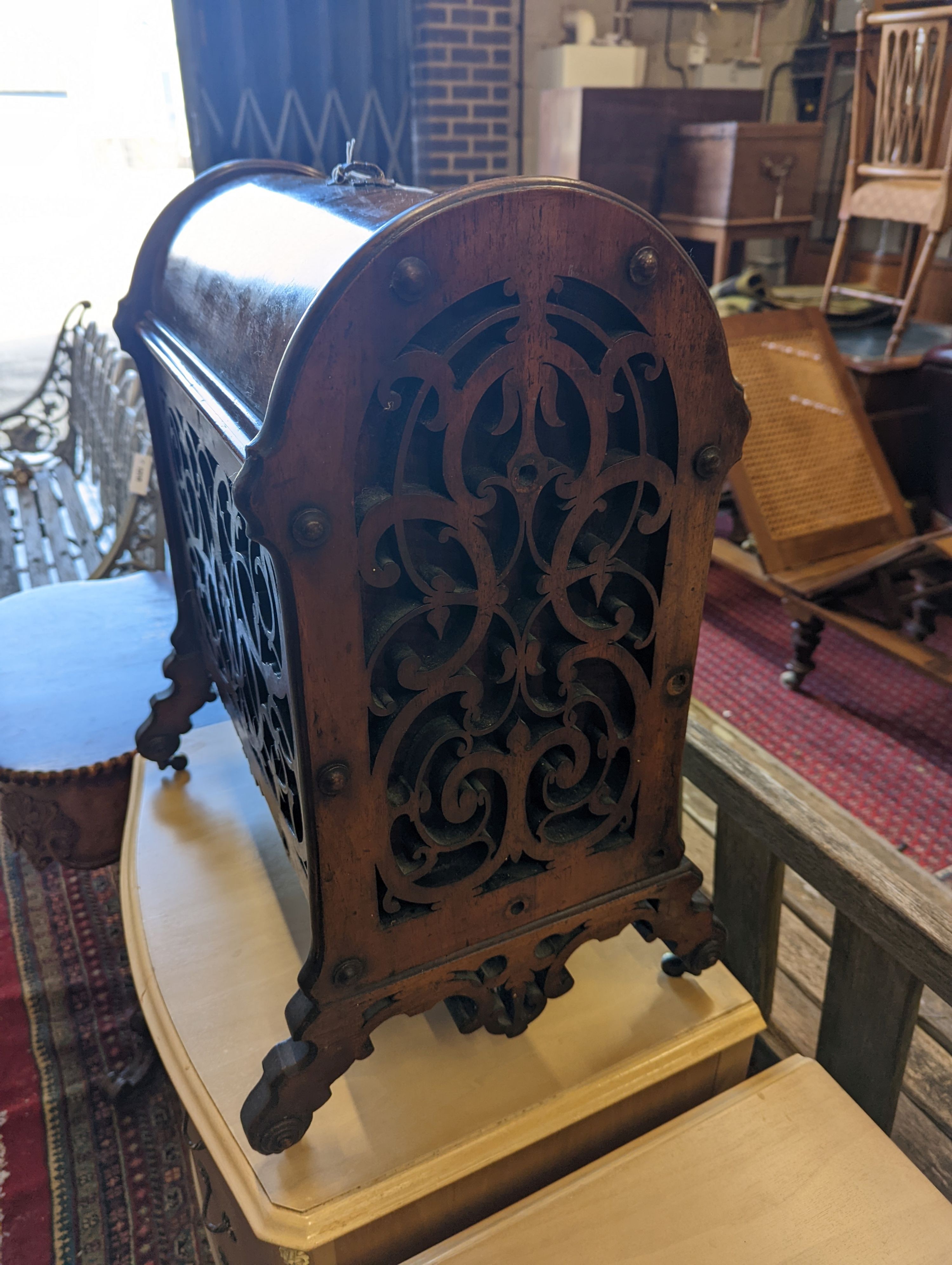 A Victorian burr walnut fret cut domed enclosed Canterbury, width 48cm, depth 38cm, height 59cm